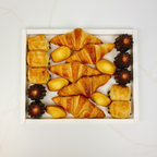 French Breakfast Platter with butter croissants, mini pain au chocolat, handcrafted cannelés and St Michel madeleines by Maison Augustine in Newcastle.