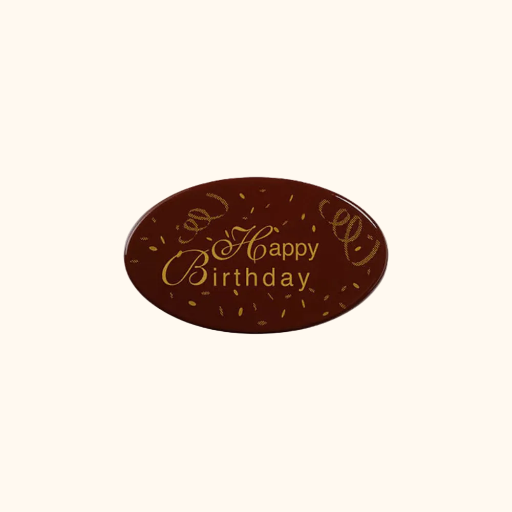 Chocolate bar with 'Happy Birthday' text on a white background