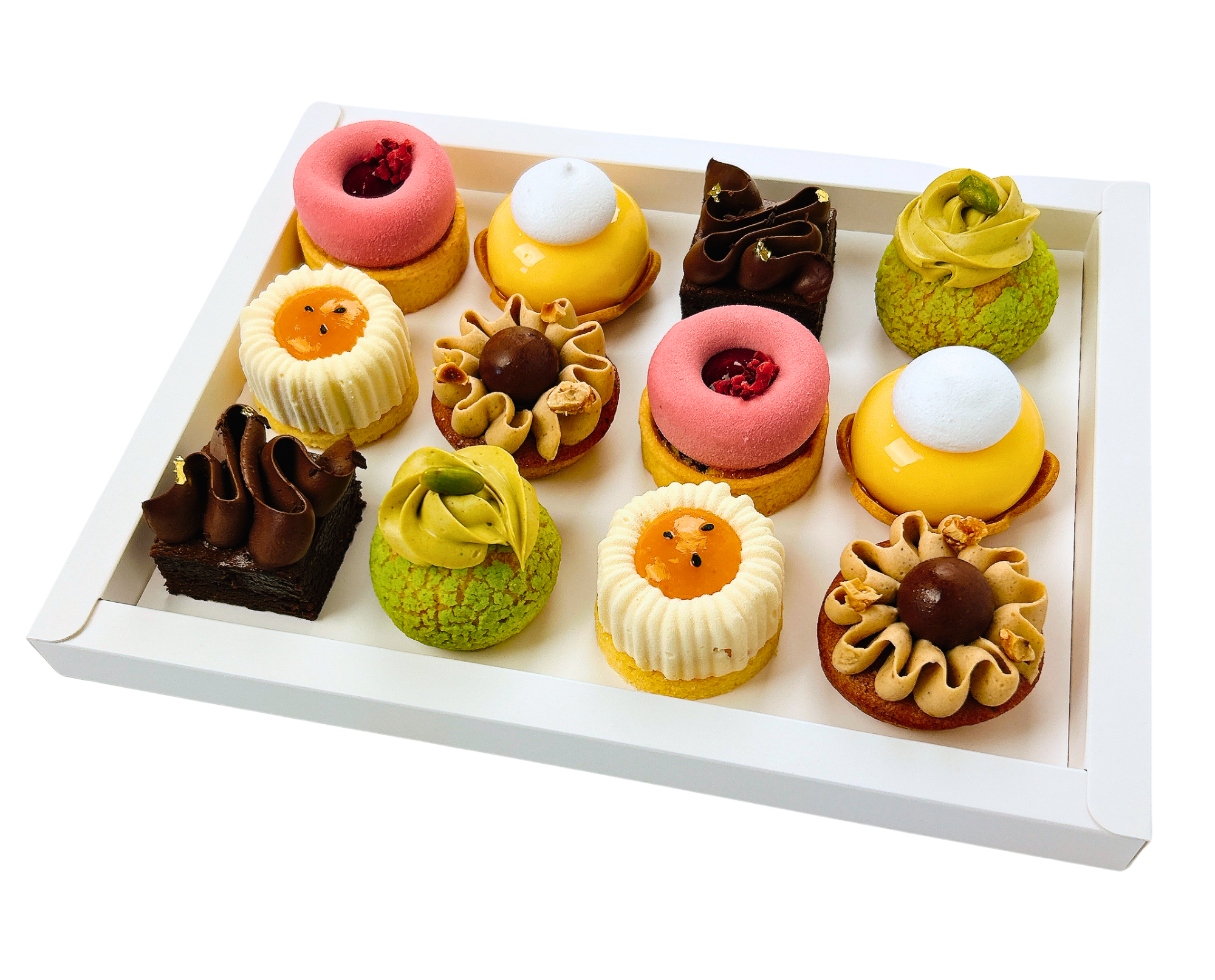 Assorted small pastries on a white tray with a white background
