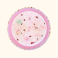 Round pink dessert with concentric circular pattern on a white background