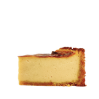 Close-up of a French vanilla flan pâtissier highlighting its silky baked custard, caramelised top and golden pastry crust.