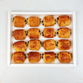 16 mini French pain au chocolat (chocolate croissants) on a platter in Newcastle